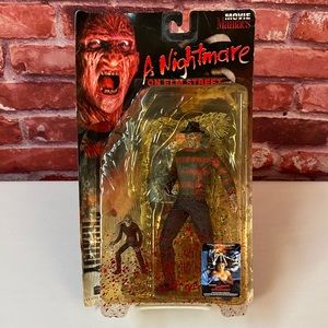 NWT FREDDY KRUGER MOVIE MANIACS FIGURE 1998